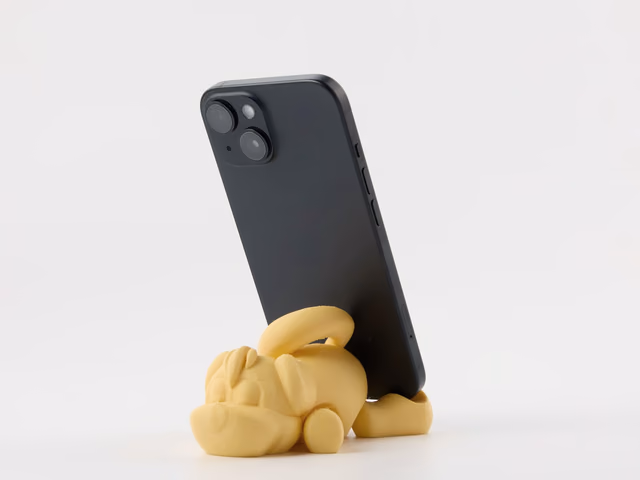 Soporte de teléfono impreso en 3D en filamento amarillo